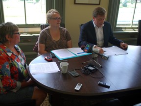 Diane White, left, and Susan Buro sit with Elgin-Middlesex-London MPP Jeff Yurek during a news conference on Wednesday, June 26, 2013. All three are trying to draw attention to what they say is a crisis facing young adults with developmental disabilities. (Ben Forrest, Times-Journal)