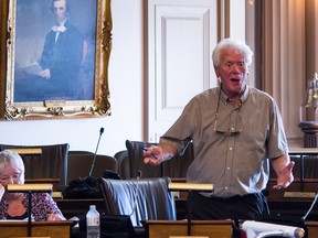 Ed Kenney talks with Richard Stephenson, the residing chair at the MPAC hearing on their Wolfe Island property earlier this year. 
Sam Koebrich for The Whig-Standard