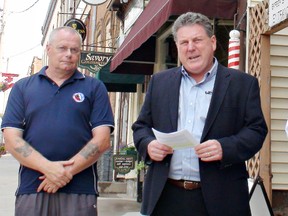 Brant MP Phil McColeman (centre) announces on Wednesday a $20,000 federal contribution to the St. George cenotaph restoration project. With him are Dave Thomson (left) of the South Dumfries Historical Society and Brant Mayor Ron Eddy. (Submitted photo)