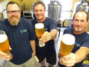 Gateway Brewing Company launched its latest brew Tuesday. The cast at Gateway describe Jethro's Farmhouse Ale as a distinctive, Belgian style summertime beer. Left to right are head brewer Chris Greasley, owner/manager Matthew Cottrell and assistant brewer Jez Tippet.

Ernst Kuglin QMI Agency