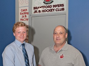 Nathan Kohler shakes hands with Brantford 99ers head coach Scott Rex after signing with the new Junior B hockey team, which will start play this fall at the new Wayne Gretzky Sports Centre. (Brian Thompson, The Expositor)
