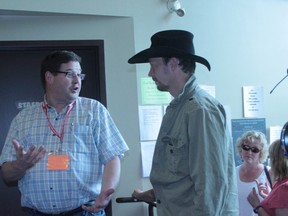 Nanton Chief Administrative Officer Brad Mason chats with Canadian country music star Paul Brandt on June 26.