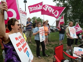 Health care workers in the region gathered on Cassells Street near Cassellholme Home for the Aged on Thursday morning to rally for the province to set four hours as the minimum standard of hand-on care at long-term care facilities. (MARIA CALABRESE The Nugget)