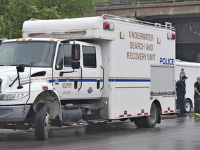 The OPP Underwater Search and Recovery Unit looks arrives at the command post on Gilkison Street in Brantford just after 1:30 p.m. to help conduct a search for  a missing 17 year old Brantford man in the Grand River, near Gilkison Flats in Brantford, Ontario.  The man was last seen by friends at about 6:00 p.m. Wednesday evening, after the small group of teenaged males had some drinks to celebrate the end of the school year, and went into the river.
BRIAN THOMPSON/BRANTFORD EXPOSITOR/QMI Agency