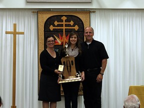 Archbishop Jordan Scots athletic directors Helena Parker and Dan Aloisio present the female athlete of the year award to Jeannine Levangie. Photo supplied