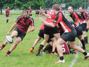 MONTE SONNENBERG Simcoe Reformer
The Norfolk Harvesters men's team — seen here during a recent game against Grimsby — are one of several teams that has a full roster. The rugby club's junior boys team is in danger of folding if it cannot increase its roster depth.