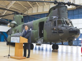 ANDRE FORGET QMI Agency
Defence Minister Peter MacKay speaks during the delivery of Canada's first new CH-147F Chinook helicopter June 27, 2013 at the Ottawa International Airport.