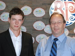 Dustin Roberge (left) and Melfort Mayor Rick Lang took part in Boston Pizza Day on Wednesday, June 26 to help raise just over $1,200 for Camp Easter Seal.