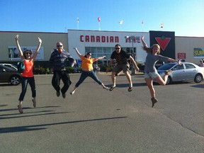 A team fulfills the requirement to jump in front of Canadian Tire during the HYPE Amazing Scavenger Hunt hosted around town, Thursday. (SUBMITTED PHOTO)