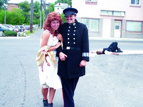 Trylight Theatre Living History Project players Andrea Johnson as Constable Ross and Allie Doerkson as Millie Watson perform a scene from Rat Portage’s colourful past, one of the troupe's street theatre vignettes from last summer.
REG CLAYTON/KENORA DAILY MINER AND NEWS/QMI AGENCY