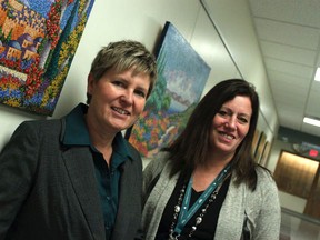 Mary-Anne Murphy (left) and Kathy DeWeerd are working to fill more of Woodstock Hospital's blank walls with local art through the Woodstock Hospital Foundation's donation program.  (CODI WILSON/Sentinel-Review)
