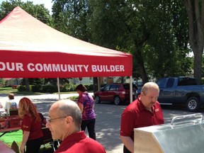 Dave Citulsky mans the grill during a barbecue held by Omega Funeral Home, Thursday. The event raised over $700 for Sunset Palliative Care. (SUBMITTED PHOTO)