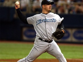 Toronto Blue Jays starting pitcher Justin Miller throws against the Minnesota Twins during the first inning of their American League game at the Metrodome in this April 28, 2004 file photo. (REUTERS)
