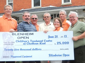 Members of the Blenheim Open Committee presented $25,000 of their remaining fundraising money to Art Stirling who accepted the cheque on behalf of the Children's Treatment Centre of Chatham-Kent Foundation, on Friday June 28, at the Blenheim Legion. The funds are to be used to complete a campaign for the newly opened playground at the children's centre. (KIRK DICKINSON, for The Daily News)