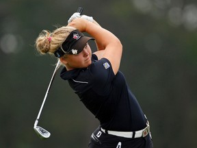 Brooke Henderson of Smiths Falls tees off on the 17th hole during the second round of the 2013 U.S. Women's Open golf championship at the Sebonack Golf Club in Southampton, N.Y. 
REUTERS
