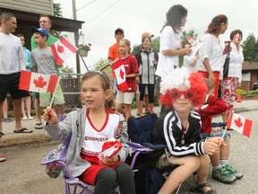 Jorja and Noah Dugas were among hundreds of people lining Callander's Main Street to see the annual Canada Day Parade, Saturday.