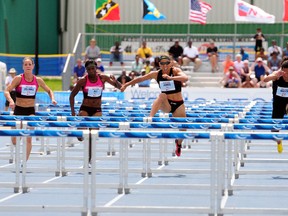American Olympic hurdler Lolo Jones competes in the women's 100-metre hurdles at the Edmonton International Track Classic at Foote Field in Edmonton, AB on Saturday, June 29, 2013. TREVOR ROBB QMI Agency