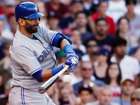 Toronto Blue Jays slugger Jose Bautista hits a two-run home run against the Boston Red Sox during  MLB action at Fenway Park in Boston, June 29, 2013. (REUTERS/Jessica Rinaldi)