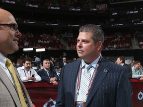 Leafs GM Dave Nonis chats with his Bruins counterpart, Peter Chiarelli, during Sunday's NHL draft in New Jersey. (Getty Images)