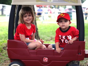Four-year-old Olivia and two-year-old Aiden Knopf made sure to wear red and white on Monday for the Canada Day celebration in Southside Park in Woodstock. (CODI WILSON, Sentinel-Review)