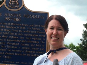 Catherine Stevenson, curator of Adelaide Hunter Hoodless Homestead, led visitors through an exhibit based on the life of John Bray, who built the homestead. (VINCENT BALL Brantford Expositor)
