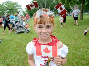 Six-year-old Mackenzie King, of Belleville, shows off her Canada Day spirit during festivities at Zwicks Park Monday.