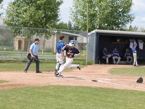 Connor McKinnon of the Fort McMurray Bantam Oil Giants crosses home plate during the team’s 8-1 win over the Calgary Cubs Saturday afternoon at Ron Morgan Park. Trevor Howlett/Today Staff