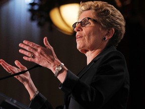 Ontario premier, Kathleen Wynne, delivers a speech to Canada 2020 on her plan to grow the economy by addressing regional infrastructure needs at the Chateau Laurier in Ottawa Wednesday, June 26, 2013. (Darren Brown/QMI Agency)