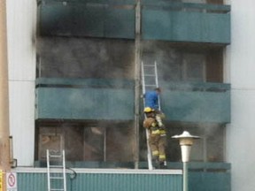 Firefighters responded to an apartment fire Sunday morning at the Balmoral Apartments on Bruce Street in the Cambrian Heights area of the city. A man, stranded on his balcony while fire destroyed his apartment, was rescued by a firefighter on a ladder. 
Photo submitted