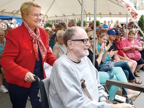 Legendary Canadian choreographer and director Brian Macdonald, with wife Annette av Paul at back, receives congratulations at the Bronze Star presentation downtown Monday. (SCOTT WISHART The Beacon Herald)