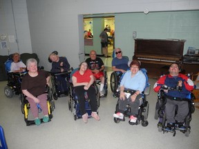 Participation House members spoke about their experiences at the organization's 35th anniversary party Thursday, June 27, 2013. Back row from left: David Pittam, Paul Sullivan, Wayne Strafford and Vernon Hewitt. Front row: Ilona Sumegi, Susan Boyle, Vickie Iorio and Frank DaSilva. (SUSAN GAMBLE Brantford Expositor)