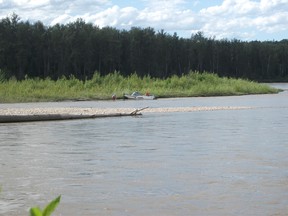 The RCMP boat was able to rescue two stranded tubers from a small island on the Athabasca River on Thursday, June 27.
Submitted