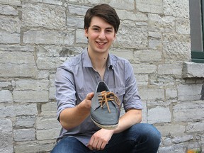Henry Barron, a member of the Queen’s Genetically Engineered Machine (QGEM) team, is one of several undergraduate students competing in an international competition with their idea to eradicate malaria by using synthetic foot odour. 
Danielle Vandenbrink/The Whig-Standard