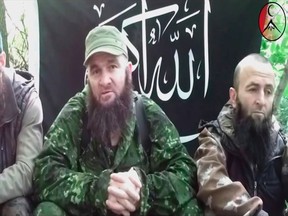 Islamist rebel leader Doku Umarov (C) speaks in a video posted on www.kavkazcenter.com July 3, 2013 in this still image taken from Reuters TV.