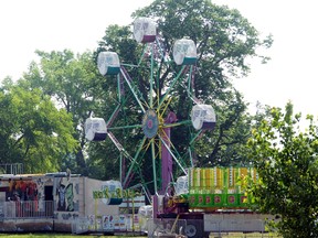 Select Shows has been busy over the last couple of days setting up the midway in Island Park in preparation for the Portage Ex taking place July 5 to 7. The midway will be open to ride enthusiasts beginning on Saturday. (ROBIN DUDGEON/PORTAGE DAILY GRAPHIC/QMI AGENCY)