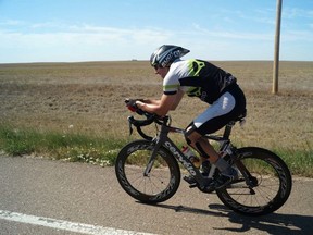 Jason Lane, a Paris native, rides through Kansas as he competes in the Race Across America in June 2013. Lane finished seventh overall and set a new Canadian record for the 3,000-mile race. SUBMITTED PHOTO