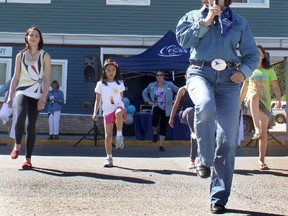 Brenda Dennis leads over a dozen people in a line dance during FCSS’s 25th anniversary celebration, June 27. FCSS has grown from a one-room office that initially provided information and passed along referrals back in 1988. Much has changed over the years as it spread its wings to help identify and fill needs in the community.