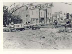 IMG 82.1216.004
July 2, 1935, Main Street Peace River was awash with water and tree debris following several days of torrential rain causing the bursting of the banks of Patís Creek. The Peace River Hotel, on land now occupied by Fast Gas, was threatened, as were other businesses in the wake of the flood as the water took the path of least resistance on its way to the Peace River. The water receded three days later, but not before causing more than $500,000 (1935 dollars) damage.