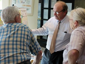 Richard Kennealy, Elliot Lake Retirement Living general manager, reviews plans for the Esten Lake cottage lot development.
Photo by JORDAN ALLARD/THE STANDARD/QMI AGENCY