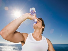 Staying hydrated during warm weather is key to avoiding heat exhaustion and sunstroke. (File photo)