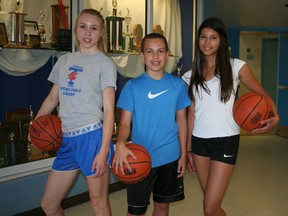 There are more than 60 students attending the elementary basketball camp at Timmins High this week. Among them are 14-year-olds Abbigail Tremblay, left, Joe Thorne and Sheila Nascimento.
