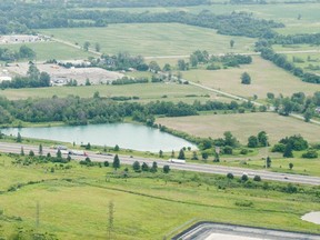 An aerial photograph looking southeast of land owned by PenEquity Corporation that they want to develop along Highway 401 west of Wellington Road in London (MIKE HENSEN, The London Free Press)