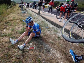 Garmin-Sharp team rider Christian Vandelde of the U.S. falls during the 228.5 km fifth stage of the centenary Tour de France cycling race from Cagnes-Sur-Mer to Marseille July 3, 2013.   (Eric Gaillard, Reuters)
