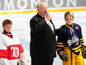 Former Edmonton Oilers anthem singer Paul Lorieau sings the Canadian and American anthems at the 2012 Brick Invitational Super Novice Hockey Tournament at West Edmonton Mall. Lorieau died of cancer on Tuesday at the age of 71.TREVOR ROBB QMI Agency
