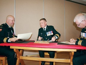 SEAN CHASE sean.chase@sunmedia.ca
Col. Kerry Horlock, commander of 2 Area Support Group (centre), officiates over the change of command for 2ASG Engineer Services. Lt.-Col. Eric Crane is taking over from Lt.-Col. Paul Fredenburg (right). For more community photos please visit our website photo gallery at www.thedailyobserver.ca.