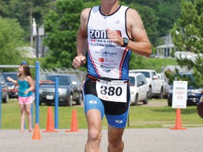 HEATHER SUTHERLAND Barry's Bay This Week
Rick Hellard of Ottawa crosses the finish line first at the Barry's Bay Triathlon and Duathlon June 30.  Hellard raced the triathlon and finished in a time of 1:35