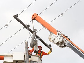 SaskPower crews take down a damaged part of the power pole at the intersection of Broadway Ave. and Crawford Ave. in Melfort. The pole had to be replaced after it was struck by lightning on Wednesday, July 3.