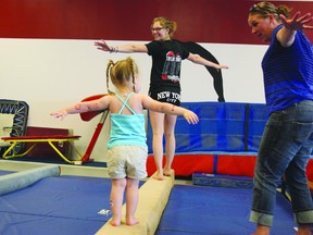 A student participates in one of the summer classes offered at the new Fort Gymnastics location in the Fort Mall. Photo by Aaron Taylor.