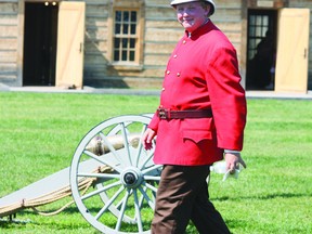 Kelly Thompson, a summer student who acted as an interpreter and tour guide of the old North West Mounted Police Fort on Canada Day, said it was a chance for residents to learn what is an integral part of Canada’s history. Photo by Aaron Taylor.