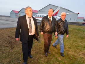 John Close,mayor of the Town of South Bruce Peninsula, Alan Barfoot, mayor and Dwight Burley, deputy mayor of the Township of Georgian Bluffs at the Wiarton-Keppel International Airport December  21, 2011 to announce the townships will trade land and transfer sole ownership of the airport to Georgian Bluffs.
WILLY WATERTON/OWEN SOUND SUN TIMES/QMI AGENCY